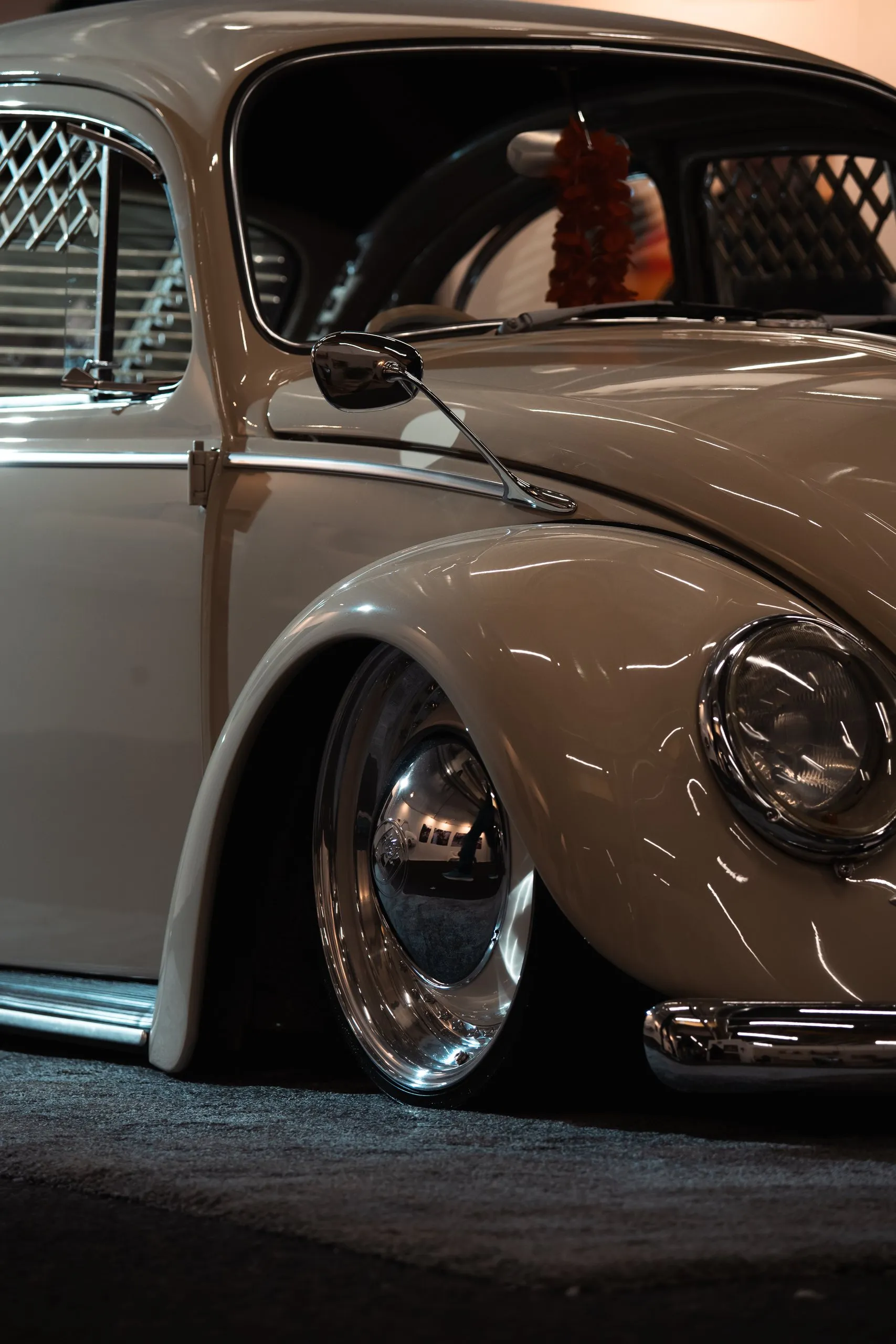 Lowered beige Volkswagen Beetle