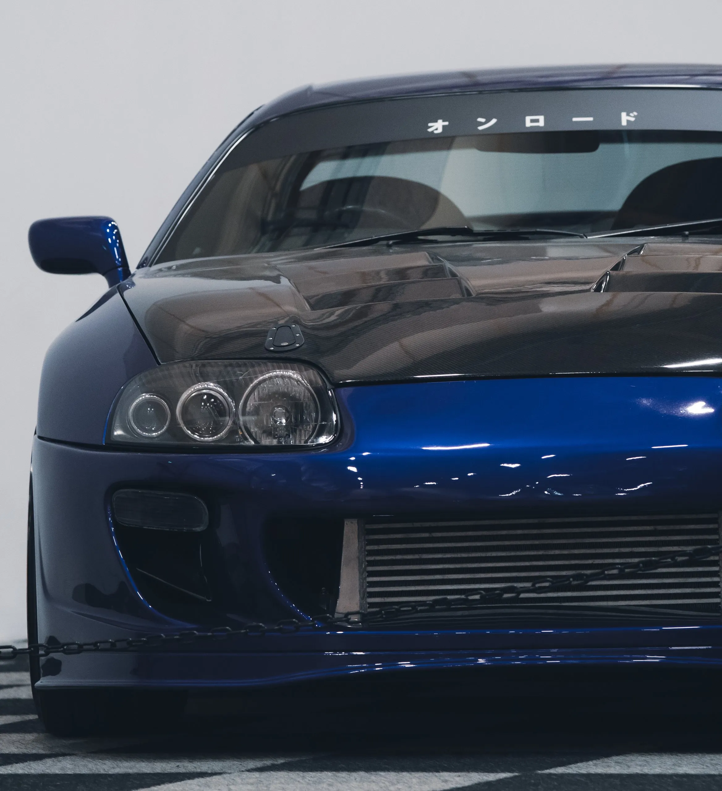 Blue Toyota Supra MK4 from the front