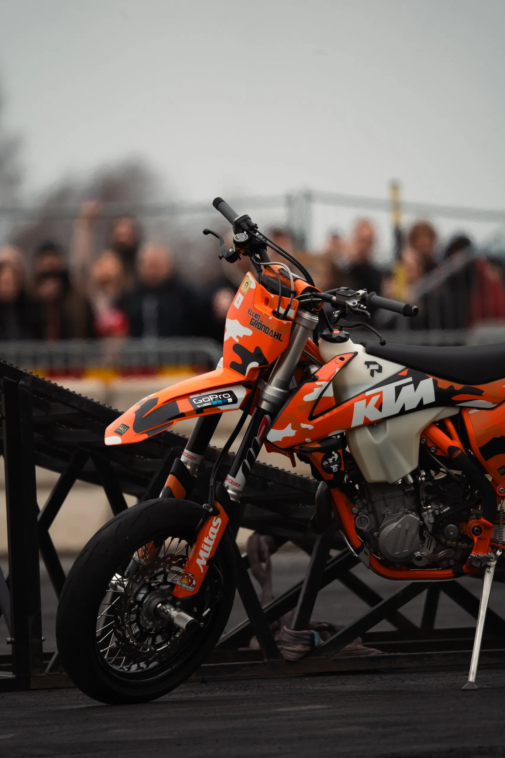 Orange KTM supermoto parked by the ramp